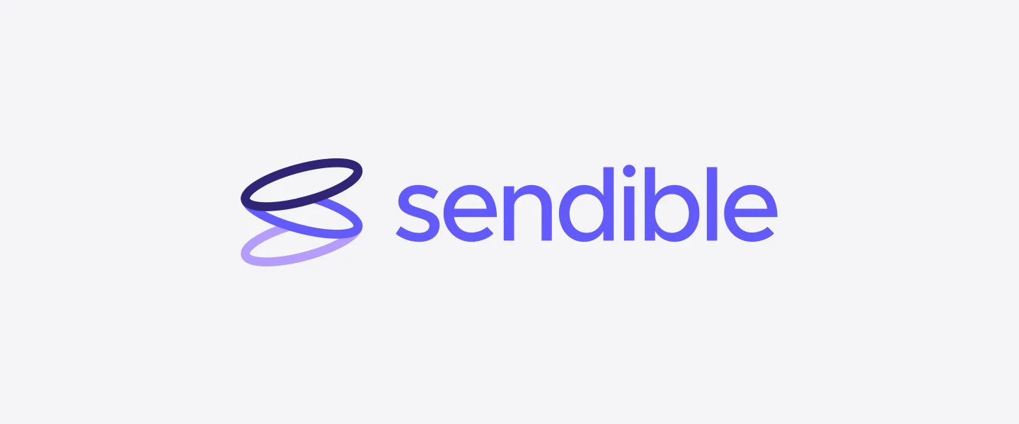 The new Sendible mark, layered indigo-to-lavender loops, beside the sendible wordmark.